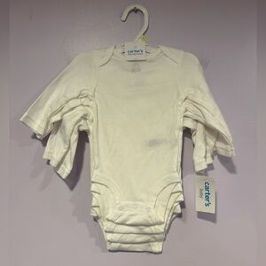 4 pack white longsleeve Carters bodysuit